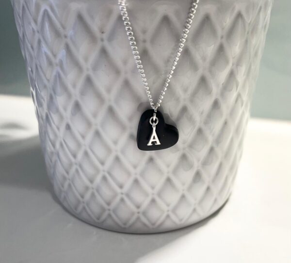 Sterling Silver chain and initial with black heart pendant